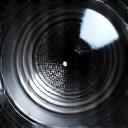 Close-up view of a precision lens or microscope objective